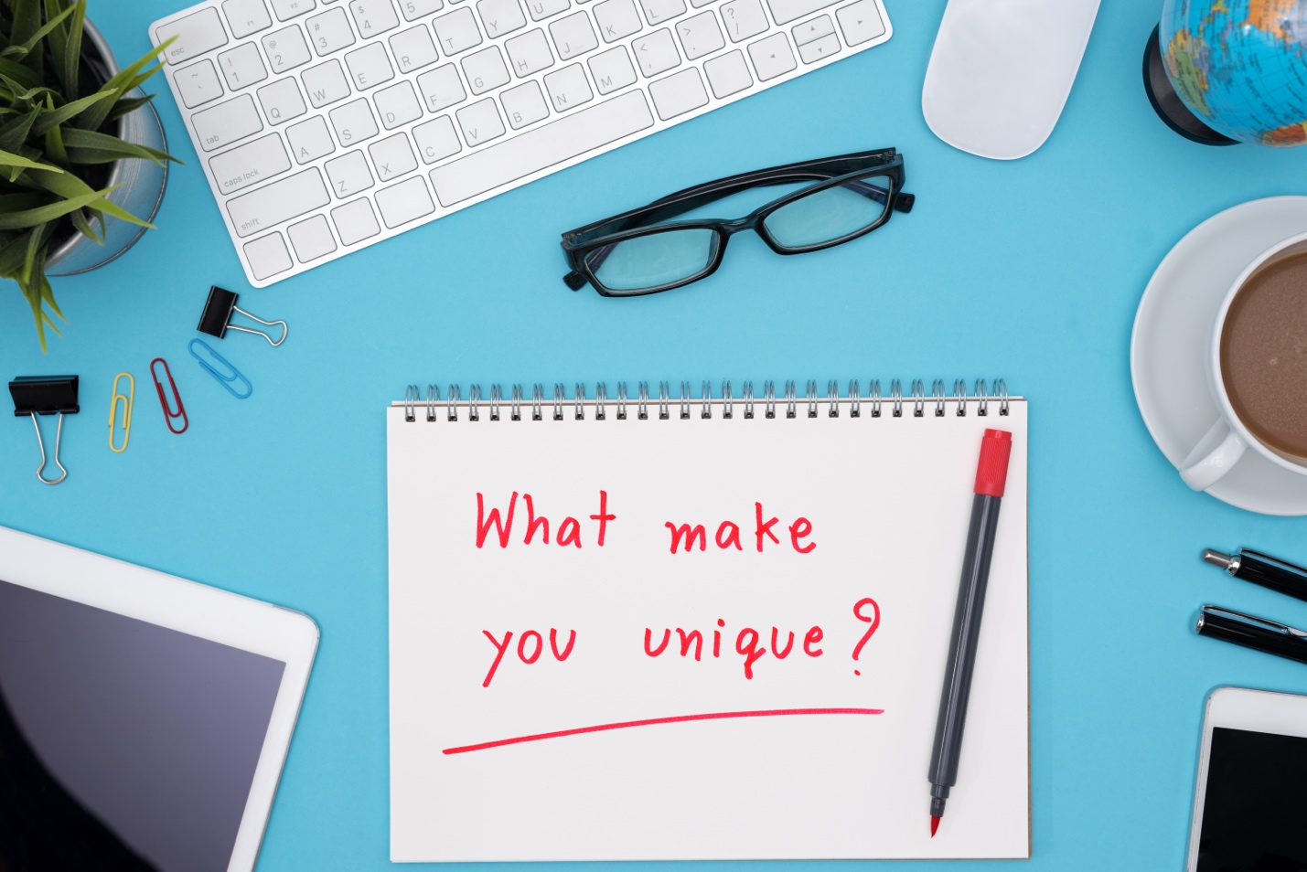 A notepad with a pen and a keyboard

AI-generated content may be incorrect.